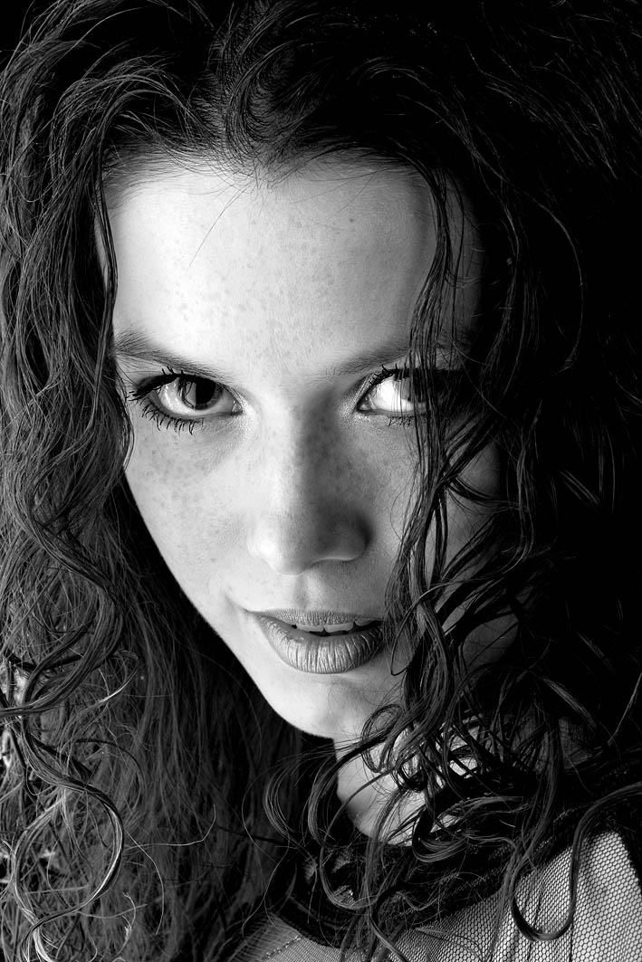 Cunning stare | woman, black and white, curls, freckles