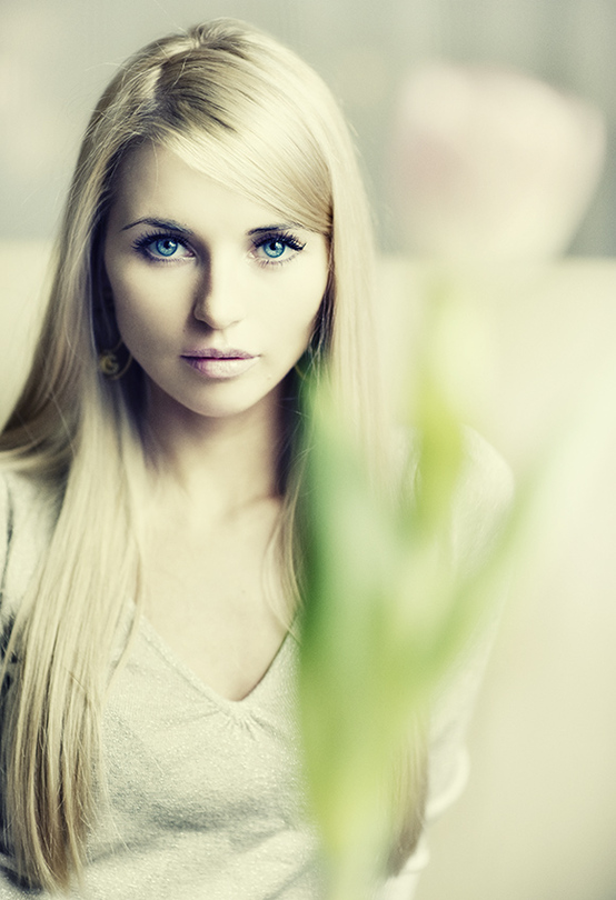 lady with a tulip | blue eyes, long hair, bokeh, desaturation, blonde