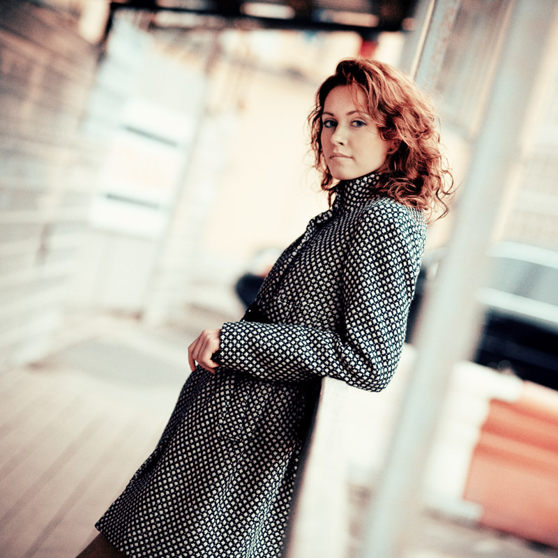 trench coat  | half-turn, bokeh, blur, redhead