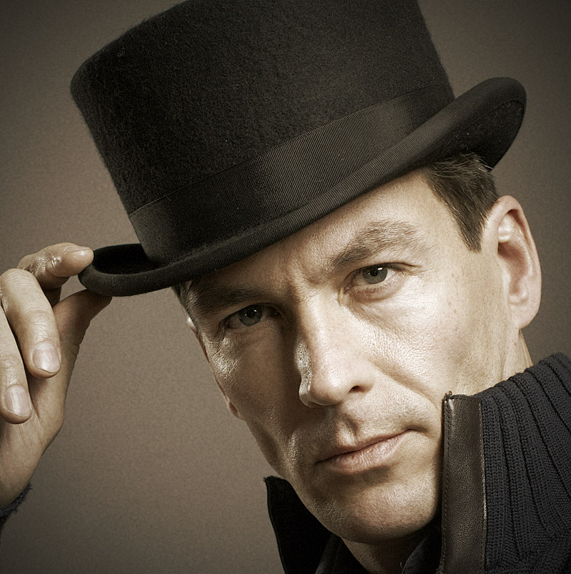 Portrait with a hat | male, desaturation, hat