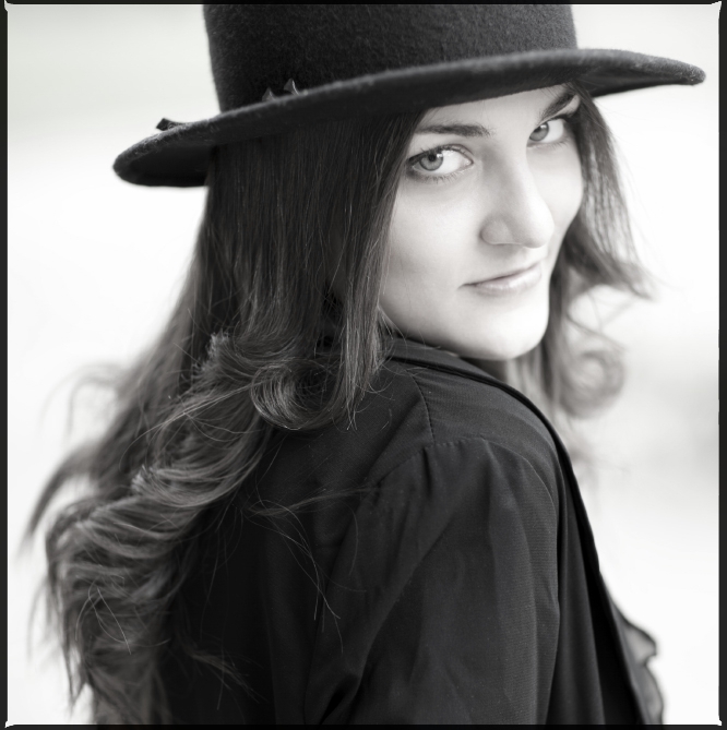 Girl wears top hat | top hat, black & white, long haired, blur