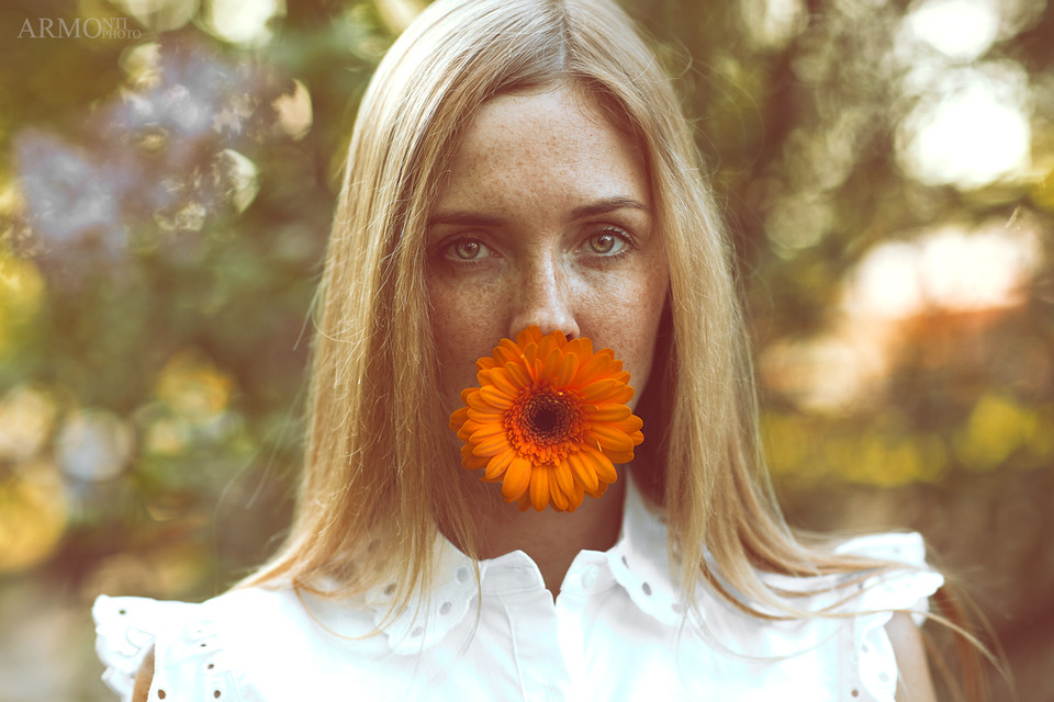 Woman eats gerbera | gerbera, flower, blond girl, white dress