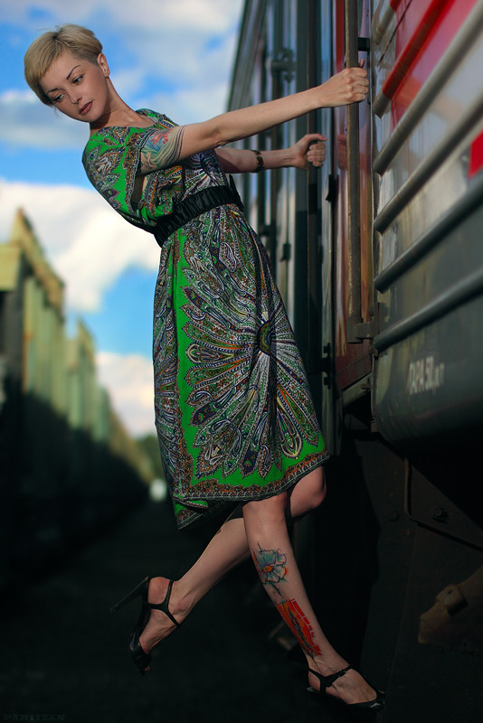 At the last moment | train, railroad station, short haired girl, sky