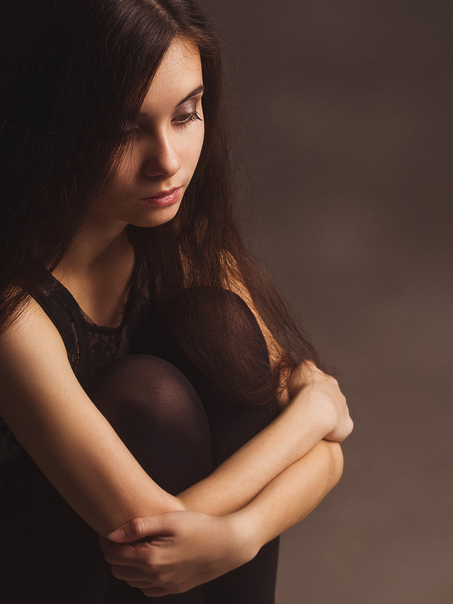 Sad girl in black shirt and stockings | sad girl, dark hair, model, photoshoot, stockings, dark room