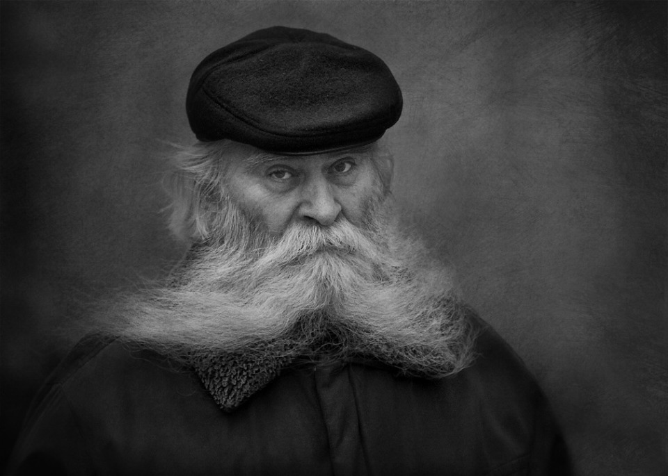 Black & white portrait of an old man | portrait, man, old, black & white, beard, moustaches, cap, jacket, eyes, severe