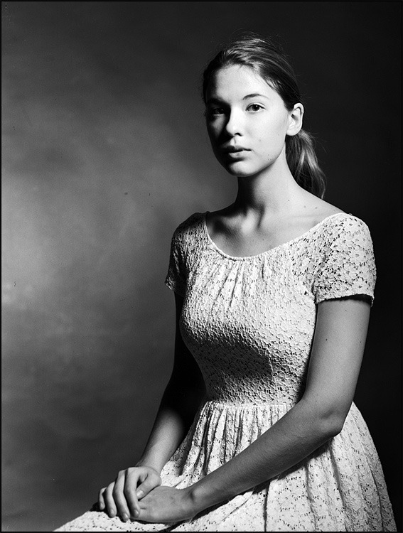 Black-and-white portrait of the young model  | portrait, model, girl, black-and-white, dress, background, ponytail, natural, young, bare-faced 