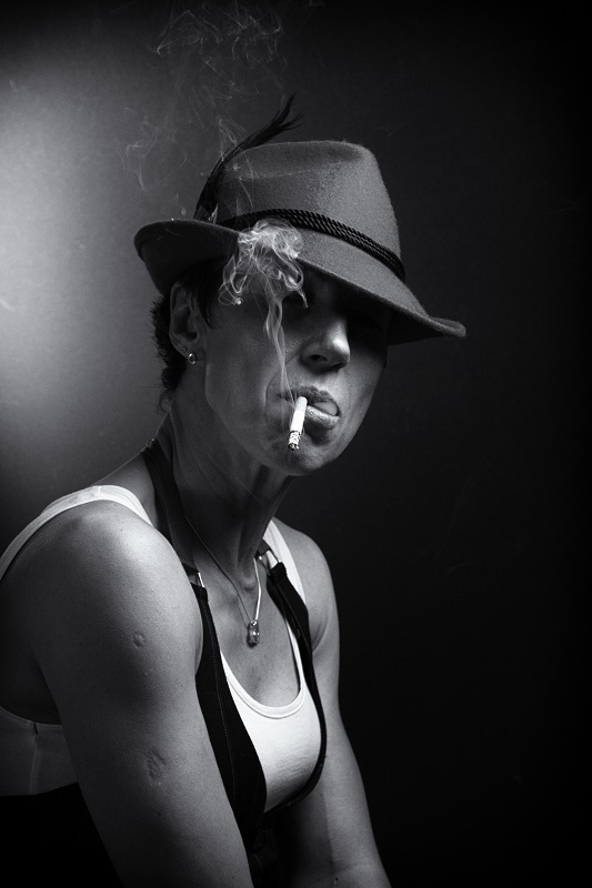 Woman with cigarette | portrait, woman, short hair , hat, smoke, cigarette, face, black & white, white top, pendant