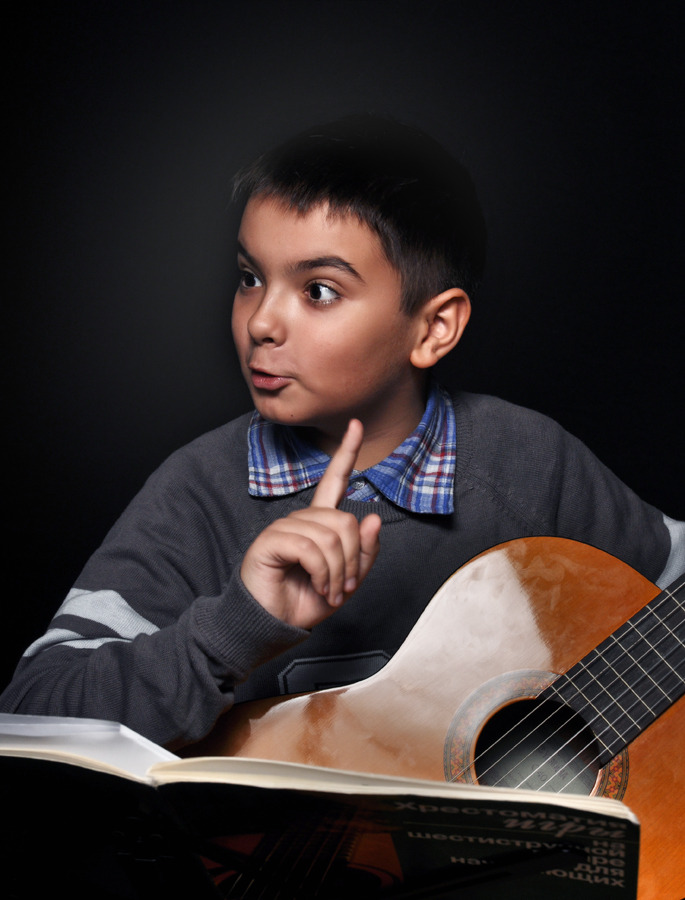 Child and guitar | child, guitar, tabs, grey sweater