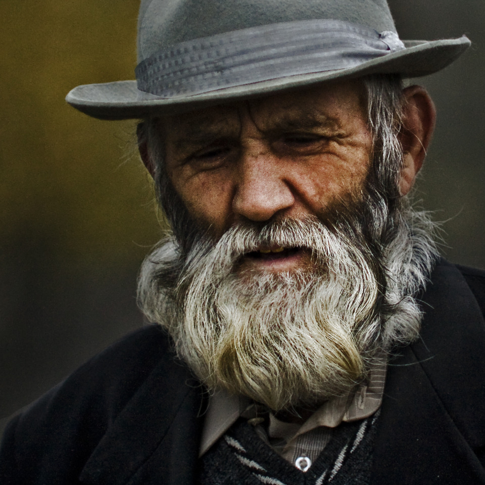 The old man with beard | beard, old man, hat, environmental portrait