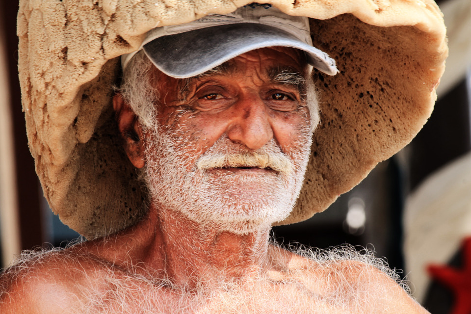 Old man wearing strange hat | strange hat, old man, beard, hairy